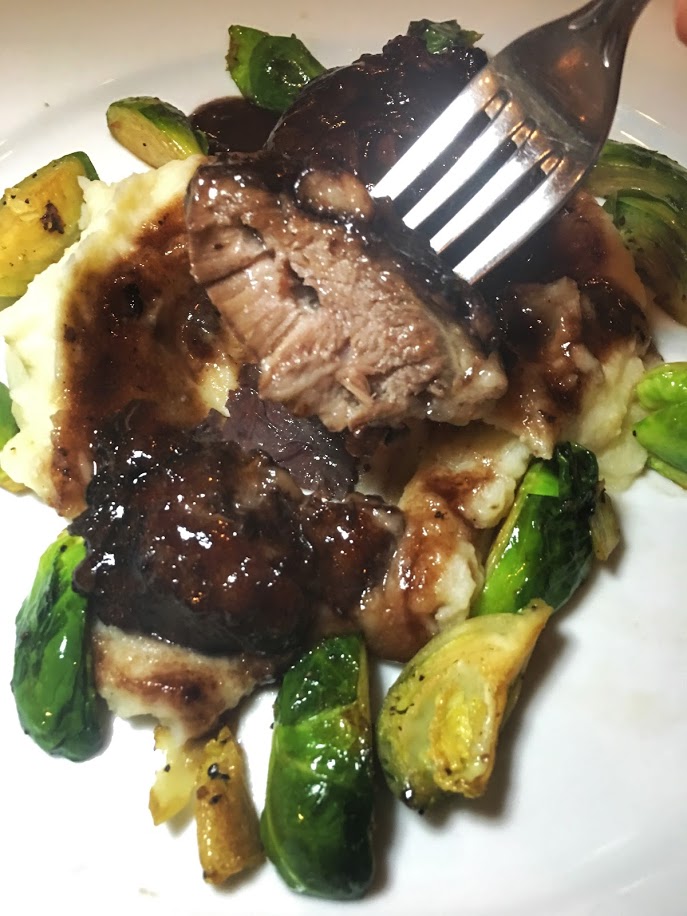 Guancia. Four hour braised veal cheeks on top of a cauliflower and potato mash. Sauteed brussels and red wine sauce